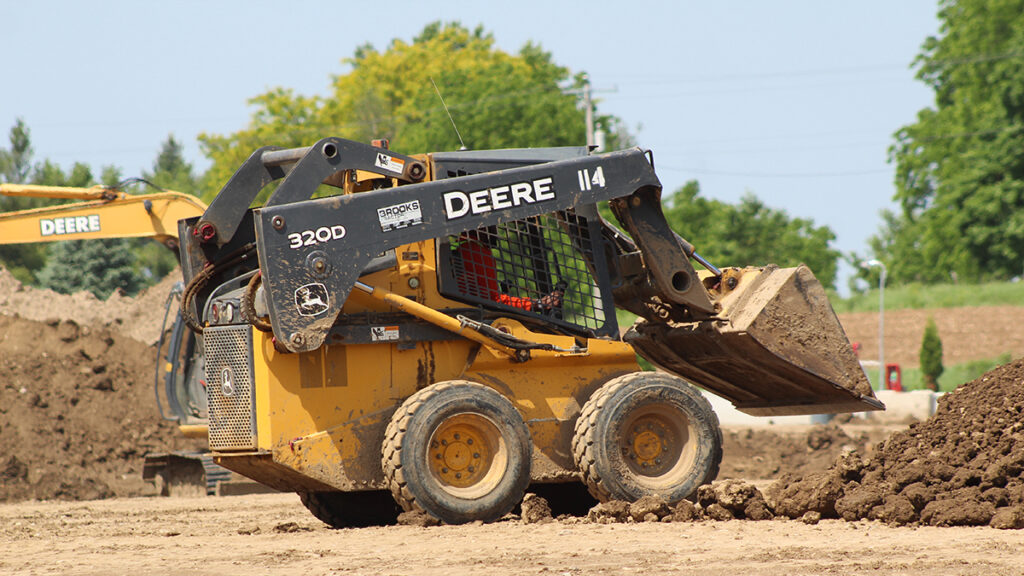Understanding the Mechanics and Use of Skid Steers In Construction